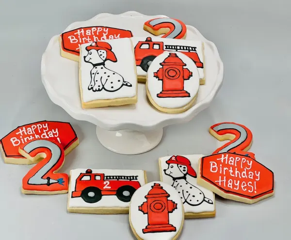 Fire truck cookie set with a dalmatian, hydrant, number 2 and Happy Birthday Hayes plaques