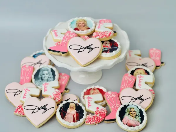 Dolly Parton cookie set with photo prints, pink cowboy boots, signature hearts and number 5 cookies
