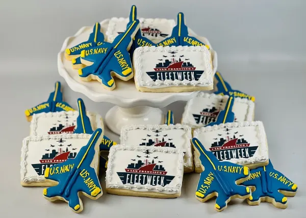 Set of cookies with blue U.S. Navy jets and San Francisco Fleet Week logo plaques