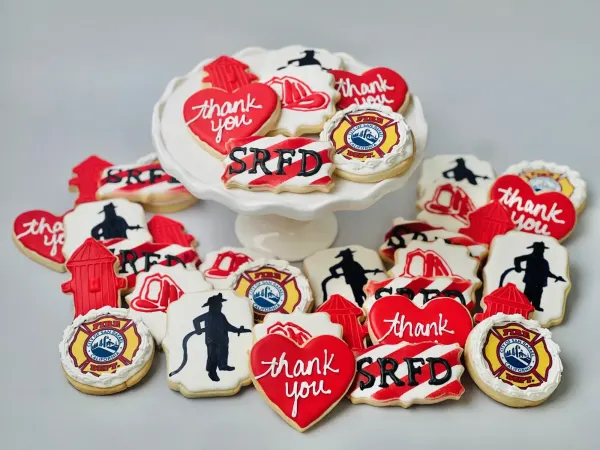 San Rafael Fire Department cookies with SRFD, thank you hearts, hydrants and firefighter silhouettes