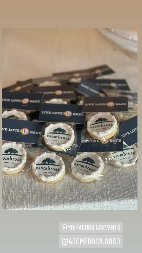 Bagged round cookies printed with an asombrosa Sonoma County oak tree logo, boxed for an event