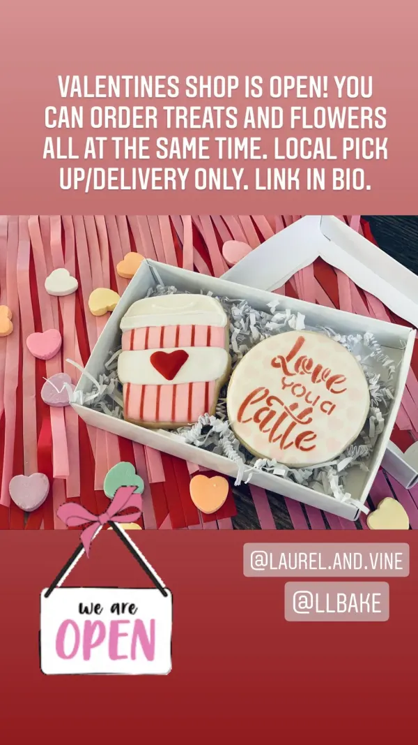 Boxed pair of cookies, a pink coffee cup with a red heart and a round cookie lettered Love you a latte