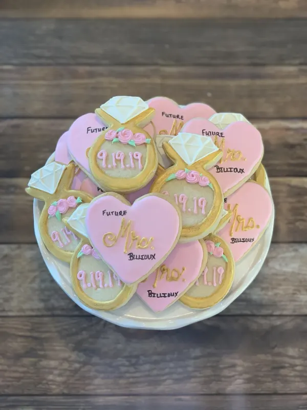 Bridal shower cookies with pink Future Mrs Billioux hearts and gold ring cookies dated 9.19.19