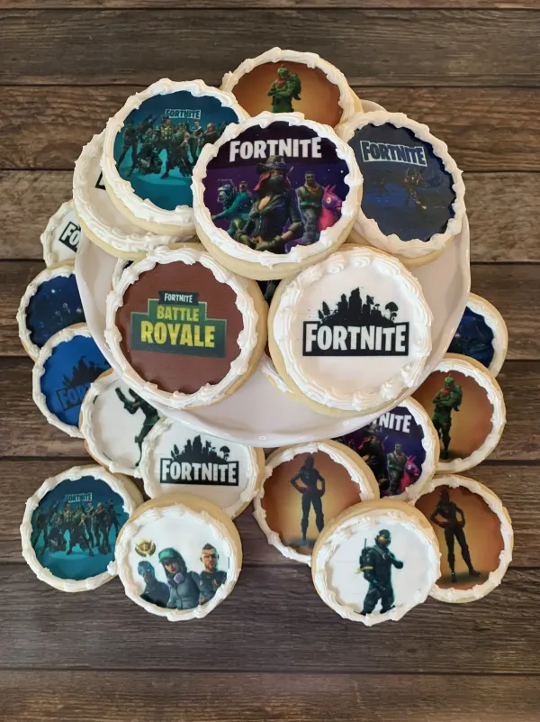 Round cookies printed with Fortnite Battle Royale logos and character artwork