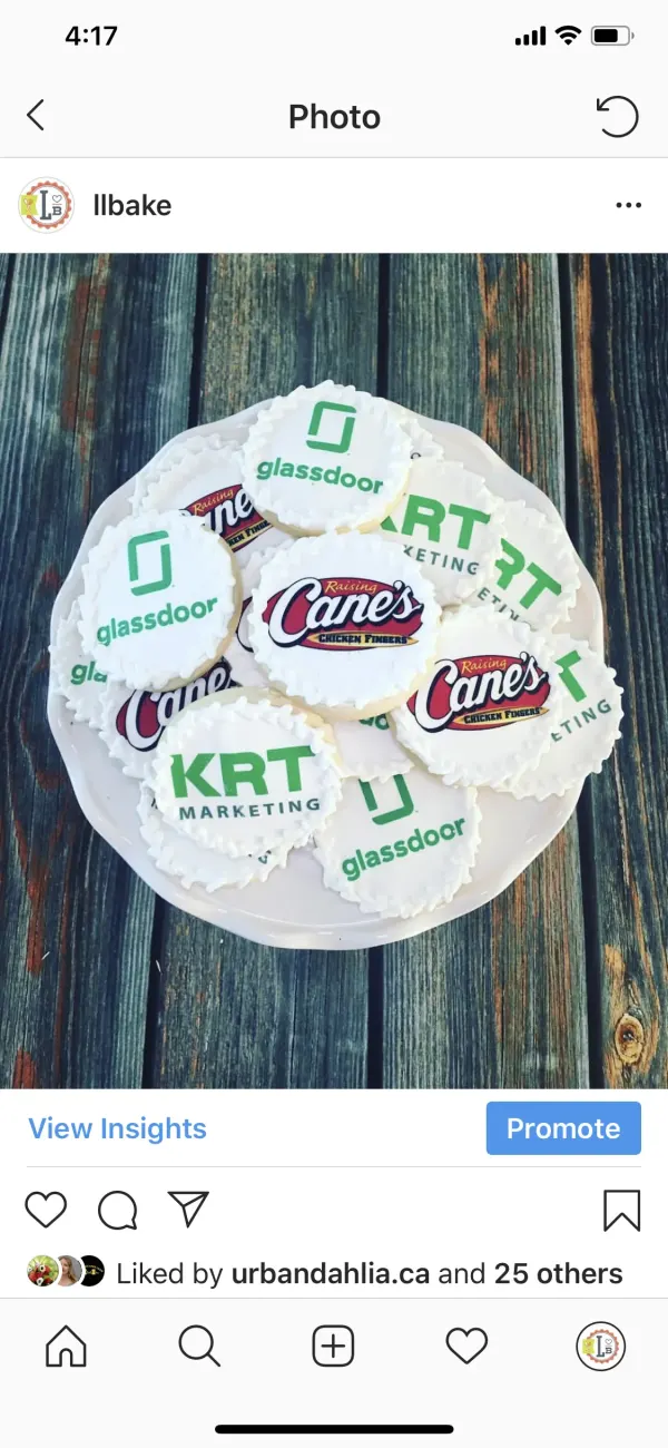 Plate of white logo cookies printed for corporate clients including glassdoor and KRT Marketing