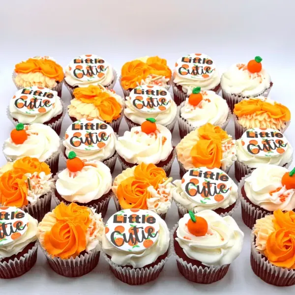Cupcakes with orange and cream swirls, fondant clementines and Little Cutie toppers
